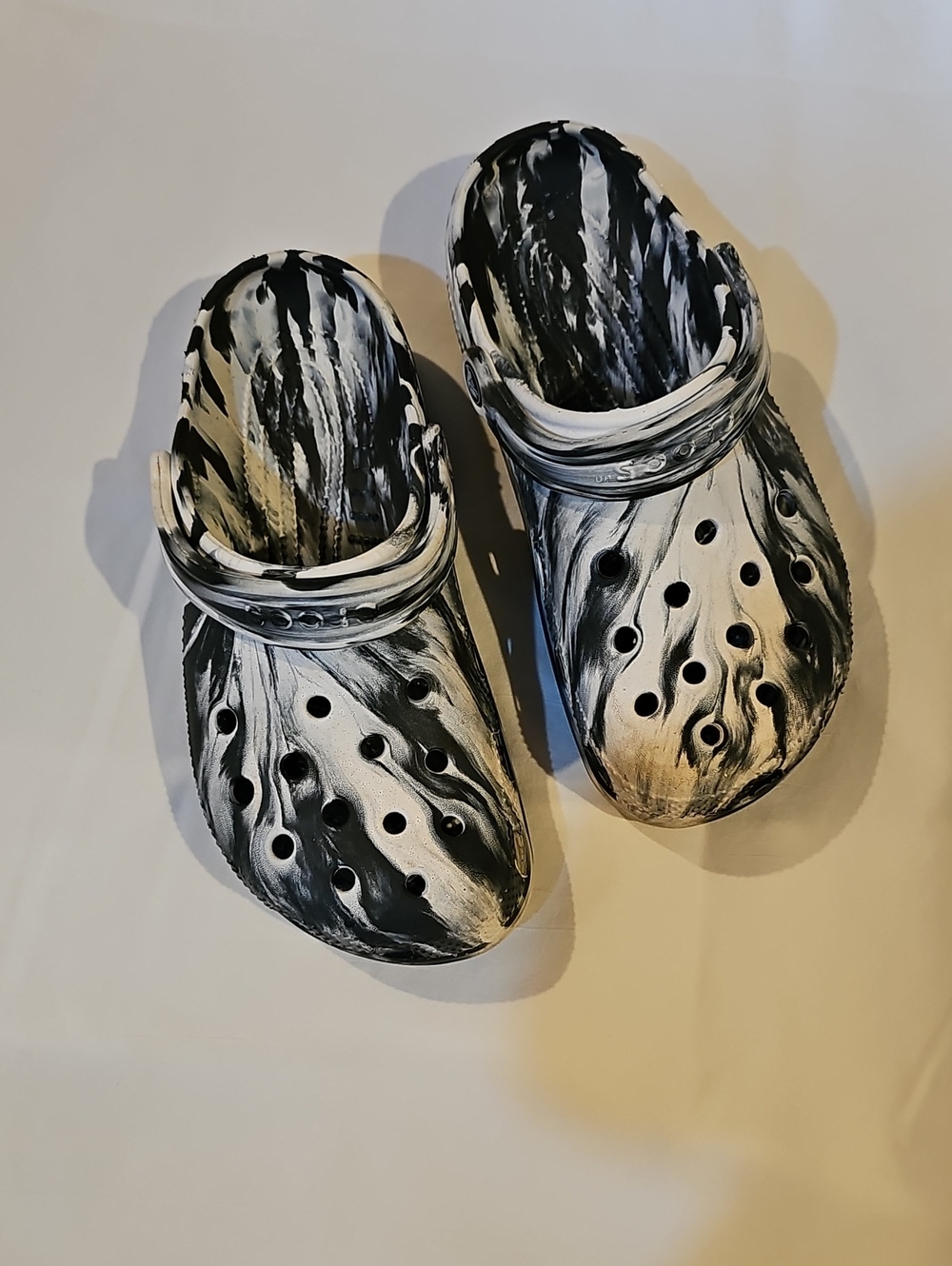 Crocs Black & White Marbled Slip-On Clogs